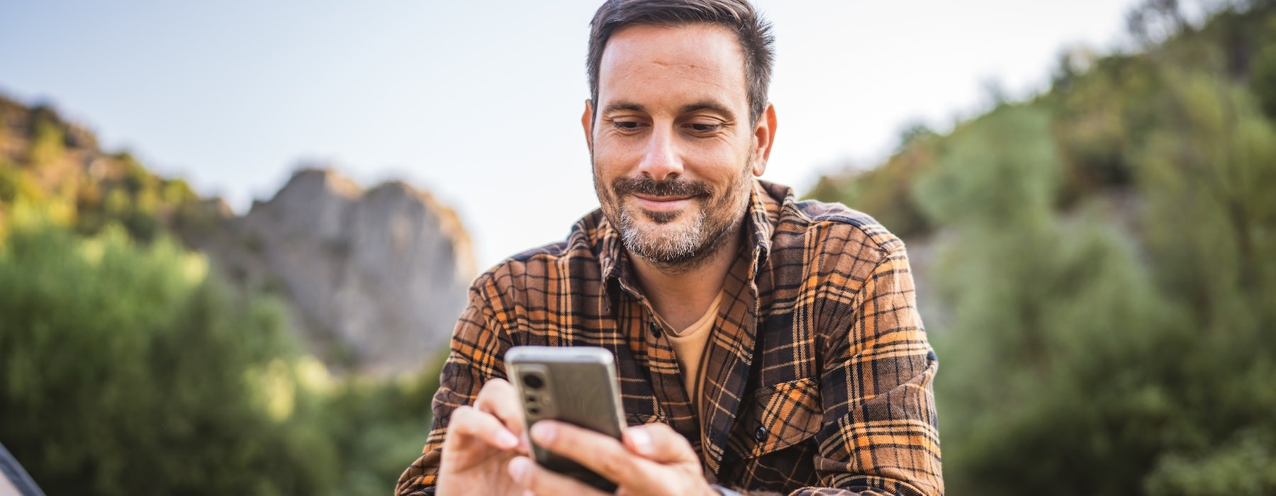 a man holding a phone